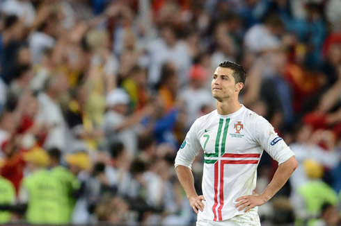 Cristiano Ronaldo smiling with his hands on his hips, in Spain vs Portugal for the EURO 2012