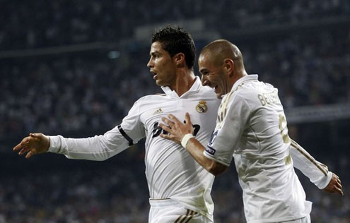 Cristiano Ronaldo being grabbed by Benzema after scoring his goal against Ajax in 2011