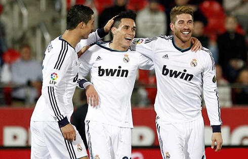 Cristiano Ronaldo greeting and congratulating Callejón for his Real Madrid goal, with Sergio Ramos nearby