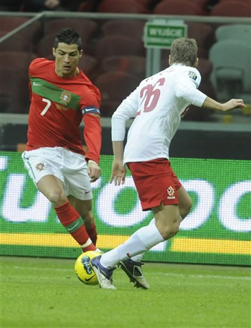 Cristiano Ronaldo starts dribbling in a match for Portugal against Poland, in 2012
