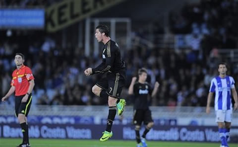 Cristiano Ronaldo jumps to celebrate the win against Real Sociedad