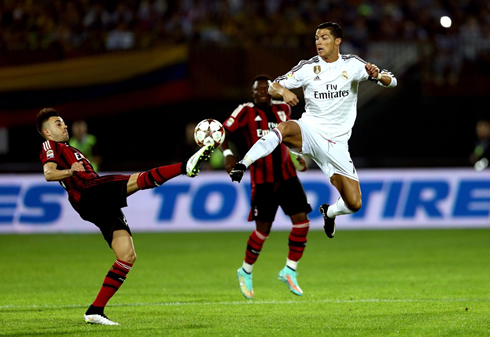 Cristiano Ronaldo challenging a ball high in the air against El Shaarawy