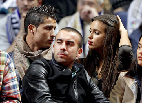 Cristiano Ronaldo chatting with Irina Shayk, in a basketball Real Madrid vs Barcelona match in Madrid