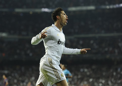 Cristiano Ronaldo running and celebrating a goal in Real Madrid vs Barcelona 2011-2012, for the Copa del Rey 1st leg