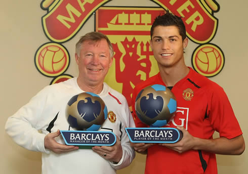 Cristiano Ronaldo and Sir Alex Ferguson holding Barclays Manager and Player of the Month awards