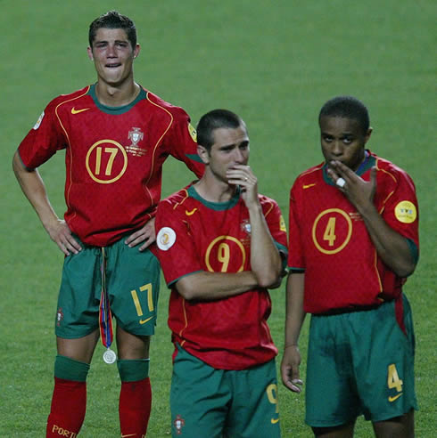 Cristiano Ronaldo crying after Portugal lost to Greece in the EURO 2004 Final, with Pauleta and Jorge Andrade also looking sad near him