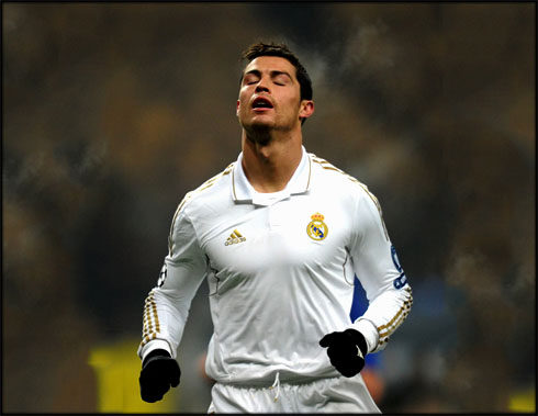 Cristiano Ronaldo is Real Madrid frustration face in the UEFA Champions League 2012 while wearing a Real Madrid jerseys without the bwin text/logo sponsorname impressed