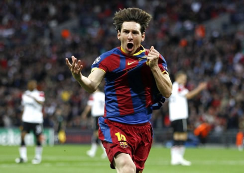 Lionel Messi in Barcelona's goal celebrations in the match against Manchester United, for the UEFA Champions League final, in 2010-2011, while holding his hand to Barcelona badge on his jersey