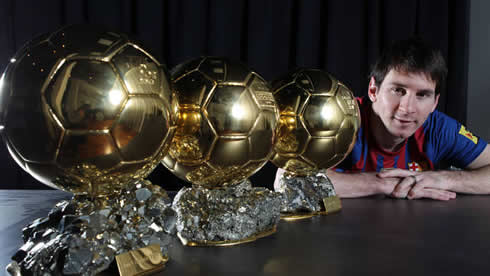 Lionel Messi photo with his 3 FIFA Balon d'Or World Player of the Year trophies/awards in 2012