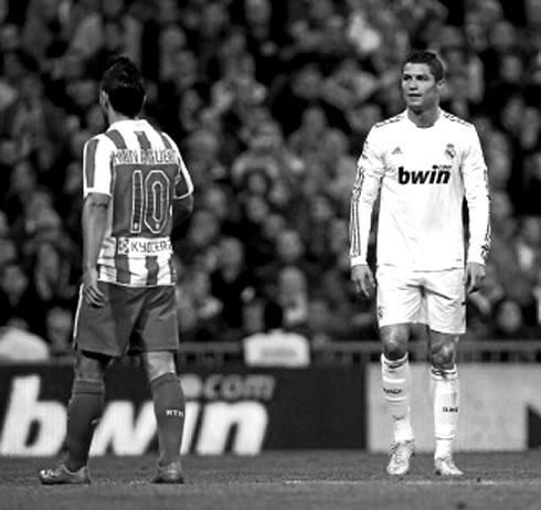 Cristiano Ronaldo and Sergio Kun Aguero, in a Real Madrid vs Atletico Madrid game, for La Liga, in 2010-2011