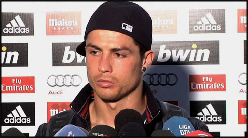 Cristiano Ronaldo post-match interview, in front of sponsors advertisements from bwin, Adidas, Fly Emirates and Audi