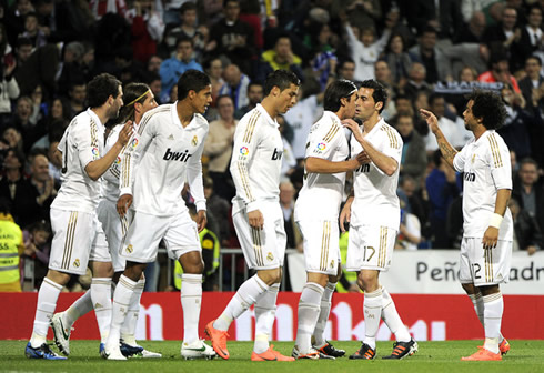 Real Madrid players celebrating a goal in 2012