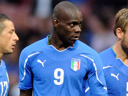 Mario Balotelli playing for Italy, with the number 9