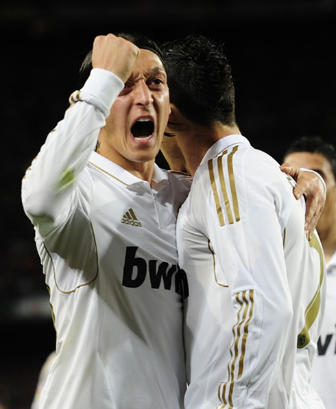 Cristiano Ronaldo and Mesut Ozil, celebrating goal for Real Madrid against Barcelona, in the Camp Nou, in 2012