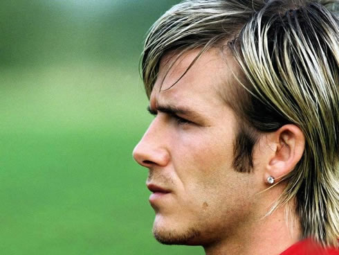 David Beckham profile photo wearing earrings