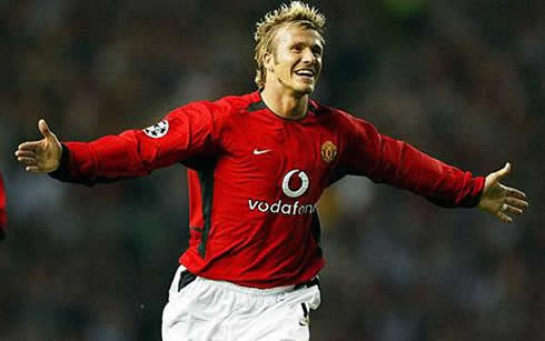 David Beckham with his arms stretched wide, after scoring a goal for Man Utd