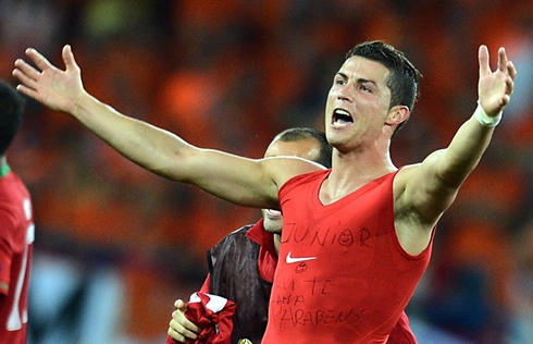 Cristiano Ronaldo in a slieveless shirt, showing his biceps muscles and a message written/dedicated to his son, Cristiano Ronaldo Jr., at the EURO 2012