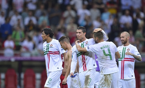 Cristiano Ronaldo celebrating with Bruno Alvez, João Pereira, Miguel Veloso and Raúl Meireles, at the end of Portugal game for the EURO 2012