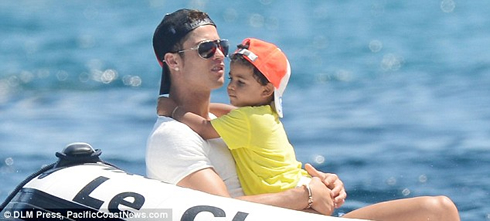 Cristiano Ronaldo hugging his son, Cristiano Ronaldo Junior, showing his father and son love and affection for each other, in 2012