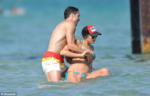Cristiano Ronaldo knocking Irina Shayk down, as they play on Saint Tropez waters, in 2012
