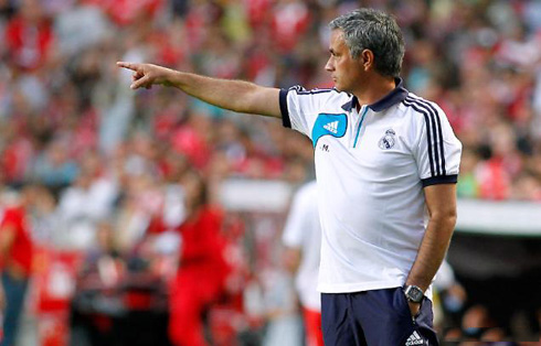 José Mourinho sending out instructions to the pitch, in Benfica vs Real Madrid in 2012