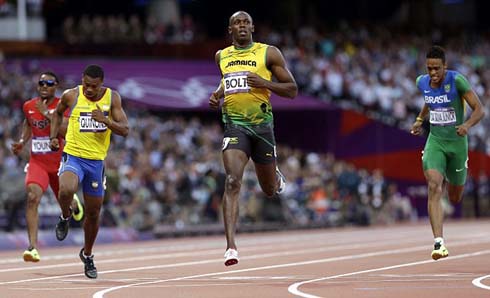 Usain Bolt flying in the air, as he sprints on the 100m athletics event