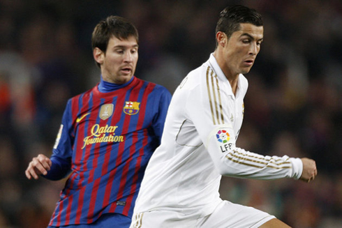 Cristiano Ronaldo getting past Lionel Messi, in a Clasico derby for La Liga, in 2012