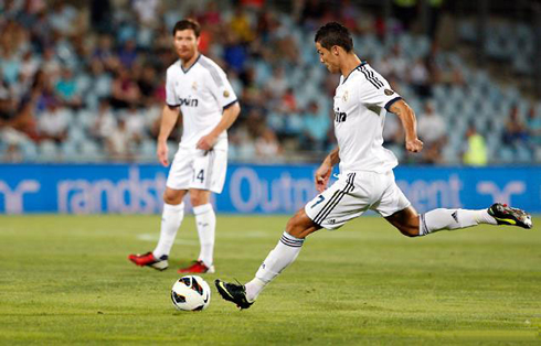 Ronaldo Kickingball on Cristiano Ronaldo Taking A Free Kickm With Xabi Alonso Watching His