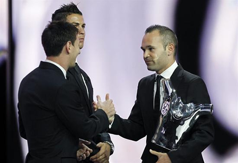 Andrés Iniesta saluting Messi, after he won the award for the Best Player in Europe, in 2012