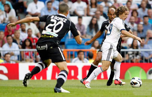 Luka Modric driving the ball in Real Madrid vs Granada, for the Spanish League La Liga 2012-2013