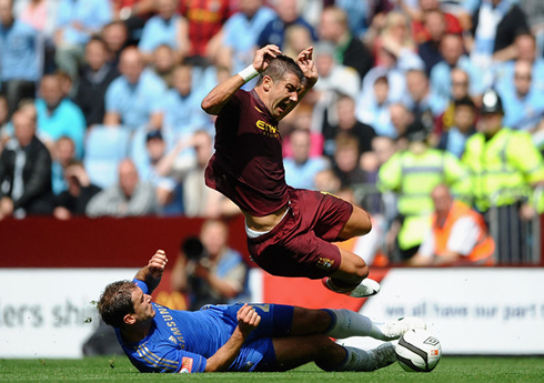 Kolarov being tackled by Ivanovic, in Chelsea vs Manchester City in 2012