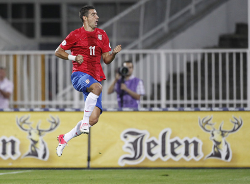 Kolarov celebrating goal for Serbia, in 2012