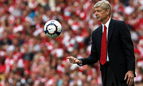 Arsene Wenger doing magic with a football, during a game for Arsenal at the Barclays English Premier League