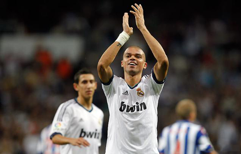 http://www.ronaldo7.net/news/2012/cristiano-ronaldo-563-pepe-clapping-the-real-madrid-fans-from-the-ultra-sur-hooligans-area-at-the-santiago-bernabeu-in-2012-2013.jpg