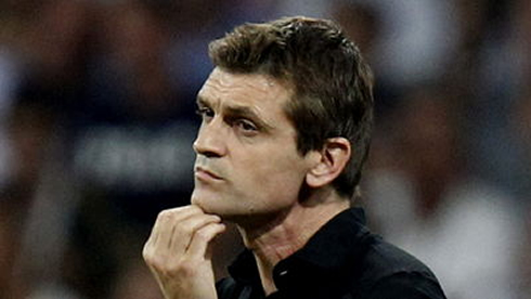 Tito Vilanova scratching his chin as he prepares his game strategy