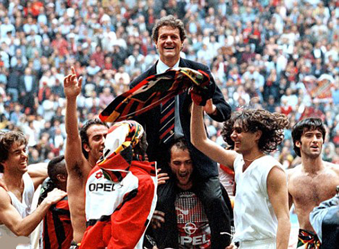 Fabio Capello celebrating AC Milan's title in the Italian League Serie A, with Paolo Maldini and Alessandro Nesta