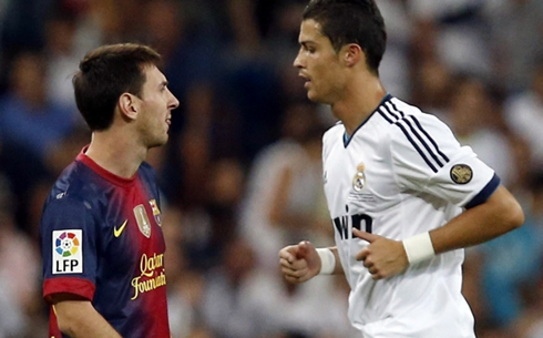 Cristiano Ronaldo and Lionel Messi crossing their paths, in a Real Madrid vs Barcelona match in 2012