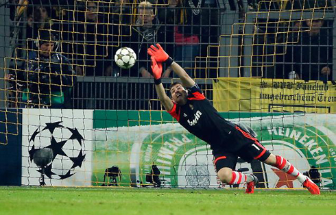 Iker Casillas flying to make a stop and save for Real Madrid, in 2012-2013