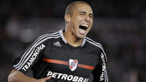 David Trézéguet in a black River Plate jersey and shirt, sponsored by PetroBras, in 2012-2013