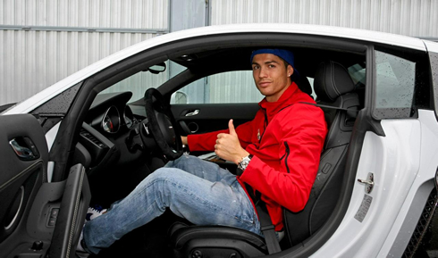 Cristiano Ronaldo inside his new Audi R8 car, given to Real Madrid players in 2012-2013