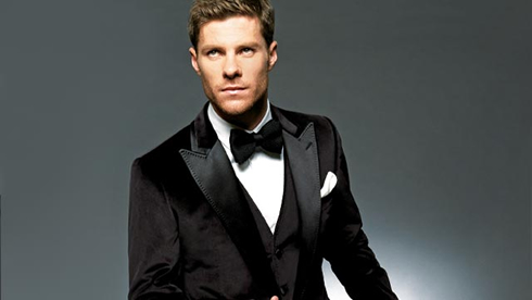 Xabi Alonso model photoshoot in a suit, as if he was the Spanish James Bond 007