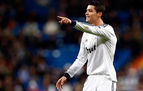 Cristiano Ronaldo pointing upfront, during a Real Madrid game in 2012-2013