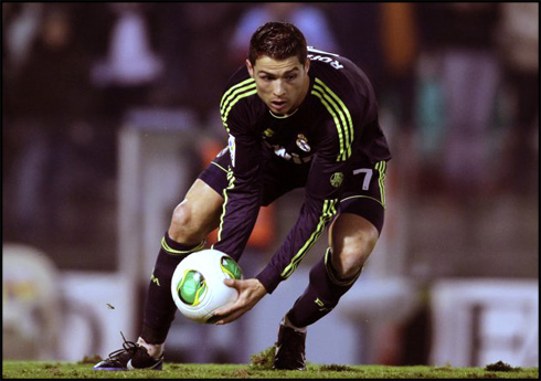 Cristiano Ronaldo in a rugby player move, showing his resilience as he tries to help Real Madrid in a remontada, in 2012-2013