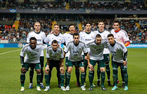 Real Madrid players showing a support shirt and jersey for Tita Vilanova's tumor disease, in Real Madrid vs Malaga, in a La Liga game in 2012-2013