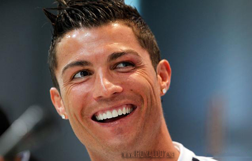 Cristiano Ronaldo genuine smile, showing his new and bit white teeth, in 2013