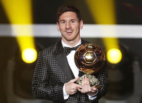 Lionel Messi wearing a white dotted suit, at the FIFA Balon d'Or 2012 ceremony and gala