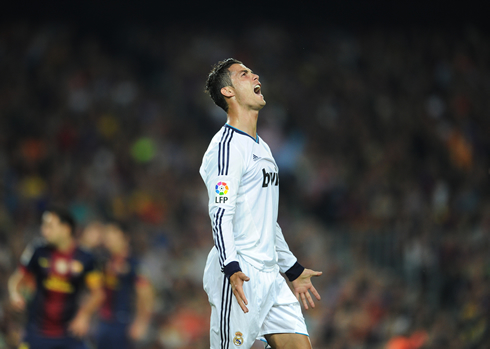 Cristiano Ronaldo playing in Real Madrid vs Barcelona, in 2012-2013