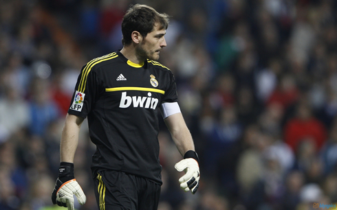 Iker Casillas in an all black goalkeeper kit and jersey, in Real Madrid 2013