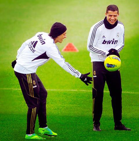 Cristiano Ronaldo and Mesut Ozil playing and having fun in Real Madrid training, in 2013
