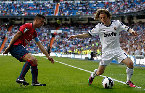 Luka Modric playing for Real Madrid in the Santiago Bernabéu
